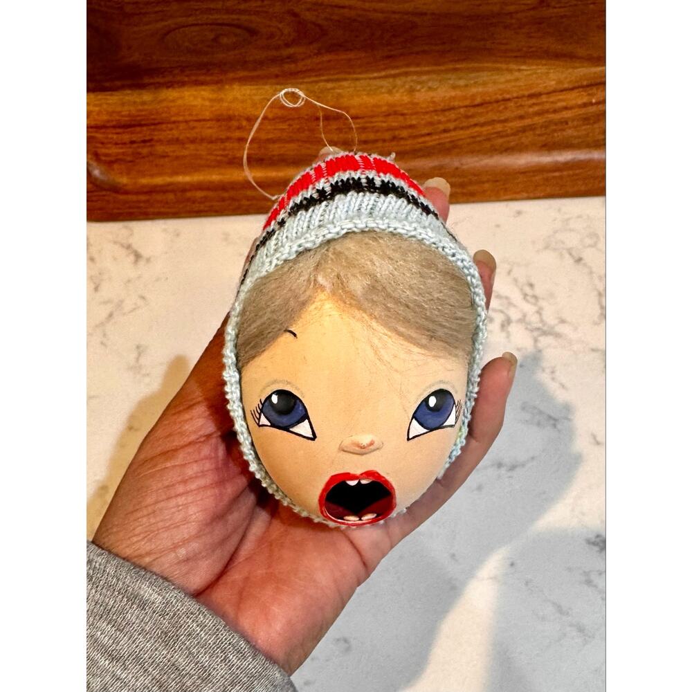 hand-painted goose egg Christmas ornament dramatic face framed w/knit winter hat